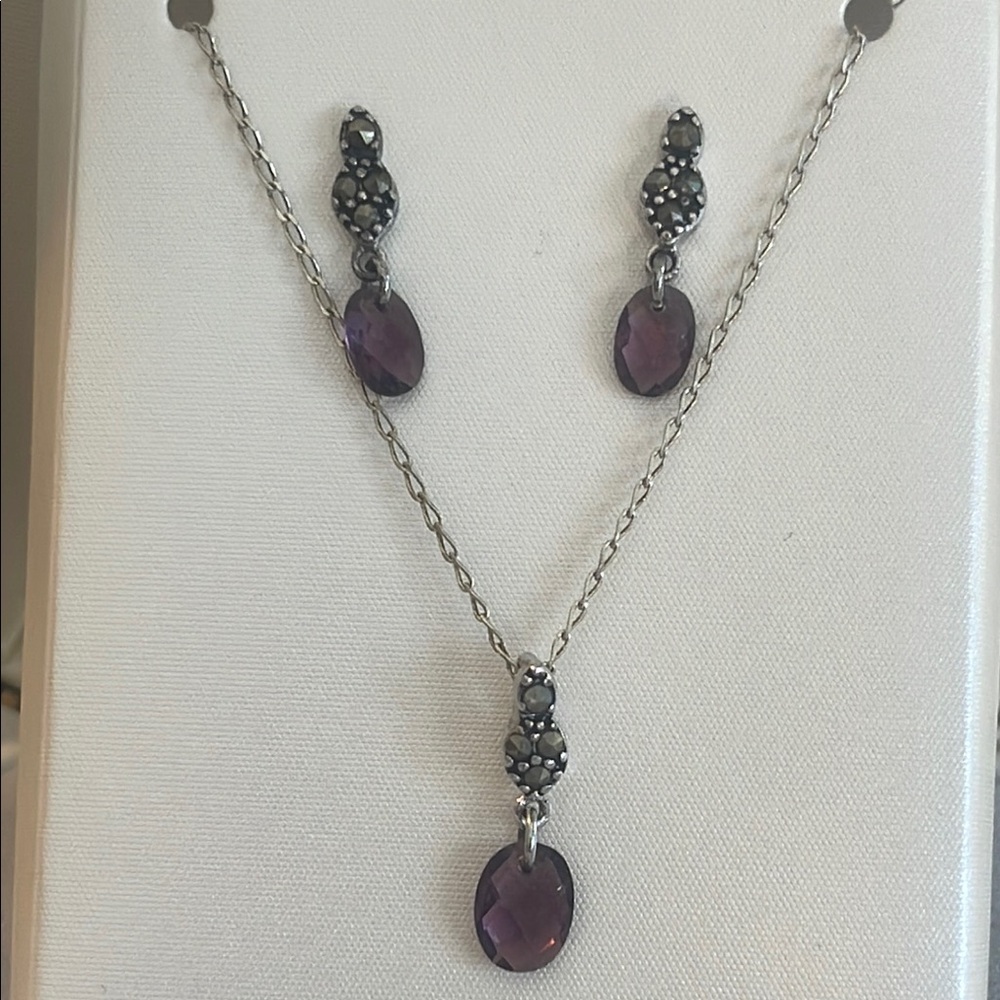 Silver and Purple Earrings with Intricate Designs